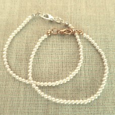 Klasiska balta vai krēmkrāsa pērļu rokassprādze 2mm Klasiska balta vai krēmkrāsa pērļu rokassprādze 2mm